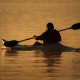 man-riding-kayak