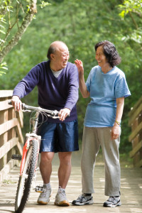 senior-couple-enjoying-exercise-at-park