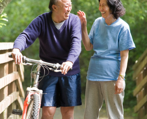 senior-couple-enjoying-exercise-at-park